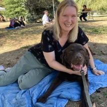 Headshot of Cathy Hooper with her dog