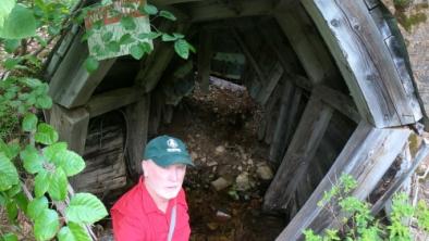 Joe Foy at entrance of mine exploration tunnel in Skagit Headwaters Donut Hole